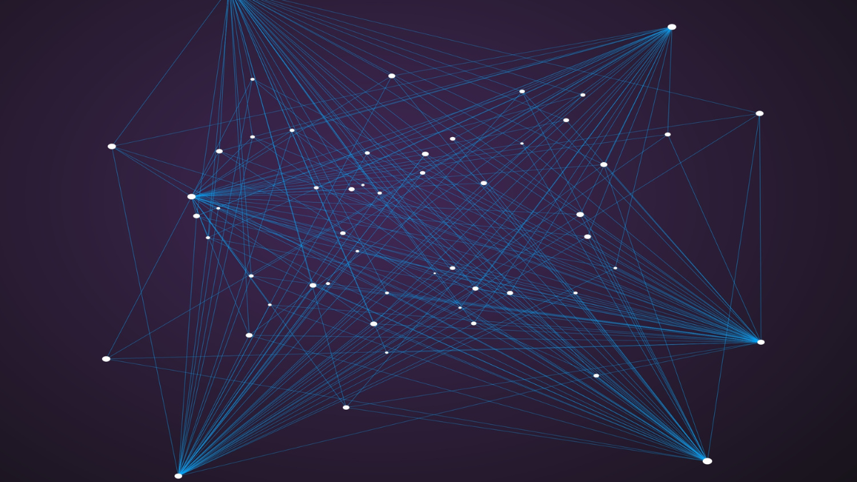 Engineers collaborating on cloud architecture in a bright workspace